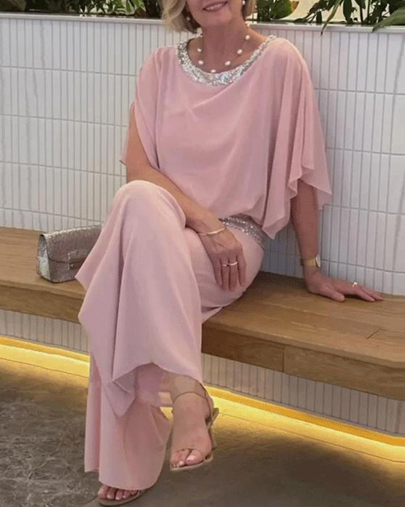 Ensemble deux pièces de luxe avec accents à paillettes et design color block