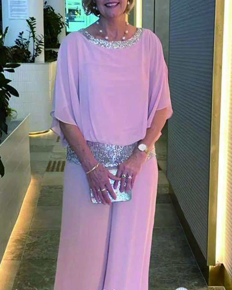 Ensemble deux pièces de luxe avec accents à paillettes et design color block