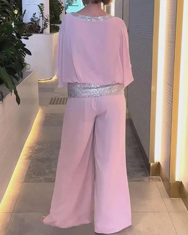 Ensemble deux pièces de luxe avec accents à paillettes et design color block
